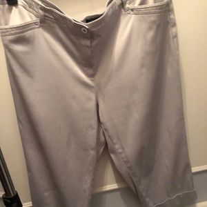 Cropped chino pants in light grey.